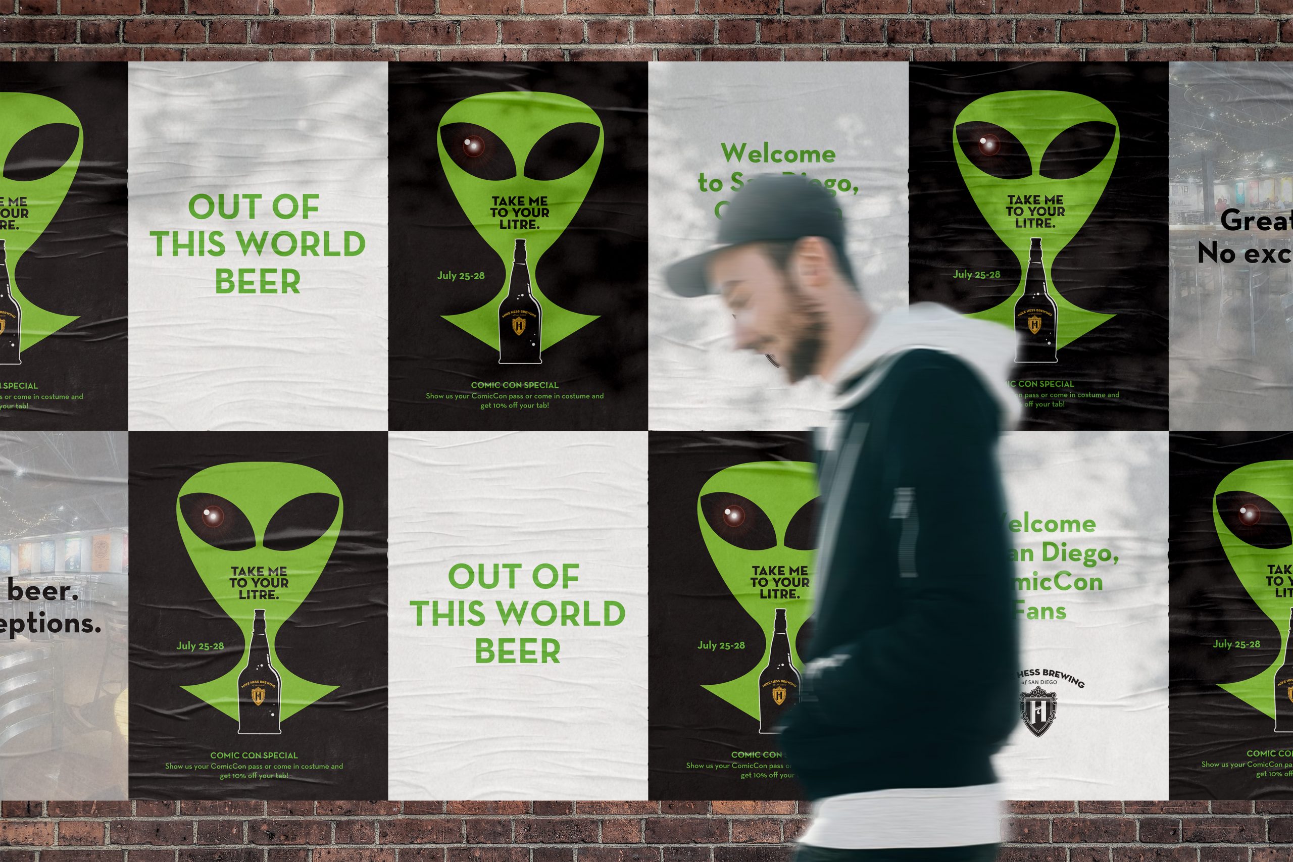 alien-scene A wall of posters. The art is an stylized, graphic head of an alien with a beer bottle in front. The text on the poster says "Take me to your litre"